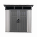 360 view of the Lifetime Farmhouse Storage Shed 60542 showing wide wood-grain double doors, black hasp latch, three skylight windows, and light gray panels