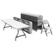 Lifetime folding table with stack of folding chairs, commercial grade plastic tabletop and steel frame ideal for parties and catering setups