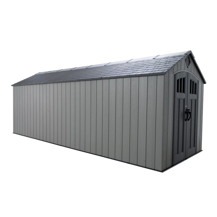 A 20x8 Lifetime gray plastic outdoor storage shed with a gable roof, double doors, and several skylights. The shed has a wood-like texture and is designed to resemble traditional wooden sheds. 