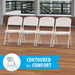 Lifetime 4 Pack White Classic Folding Chairs lined up highlighting contoured seat and back for comfort