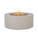 Real Flame Aegean round propane fire pit table in light sand finish with lava rocks and flames, angled cylindrical product view on white