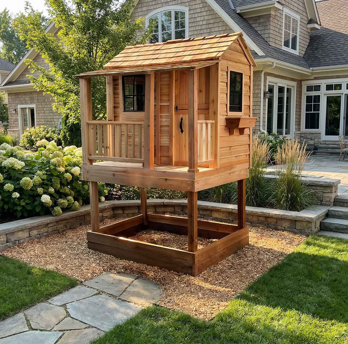 Little Cedar Playhouse 6x6 without slide attachment, set on a mulch base near a stone patio with hydrangeas