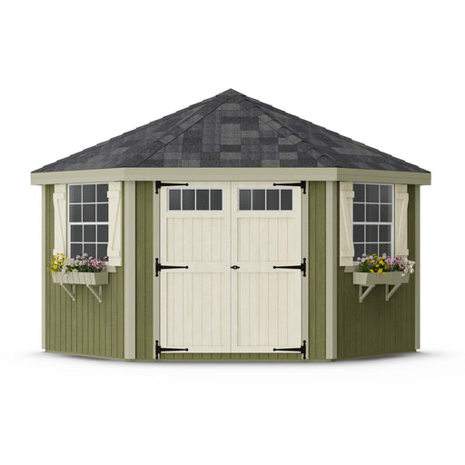 Front view of a green Little Cottage Co. Colonial Five-Corner Shed with white double doors and flower boxes.