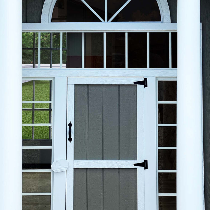 Close-up of child door on Little Cottage Co. Grand Portico Mansion playhouse, framed by columns and windows for elegant entryway detail