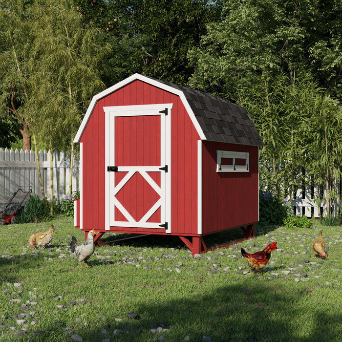 Side view of Little Cottage Co. 6x8 Gambrel Barn Chicken Coop in red with white trim, featuring a window, ramp, and hens on the grassy yard.