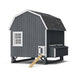 Little Cottage Co. 6x8 Gambrel Barn Chicken Coop in gray with white trim, featuring nesting box and ramp access on elevated base.
