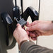 Close-up of a padlock securing the Lifetime storage shed's lockable steel-reinforced door.