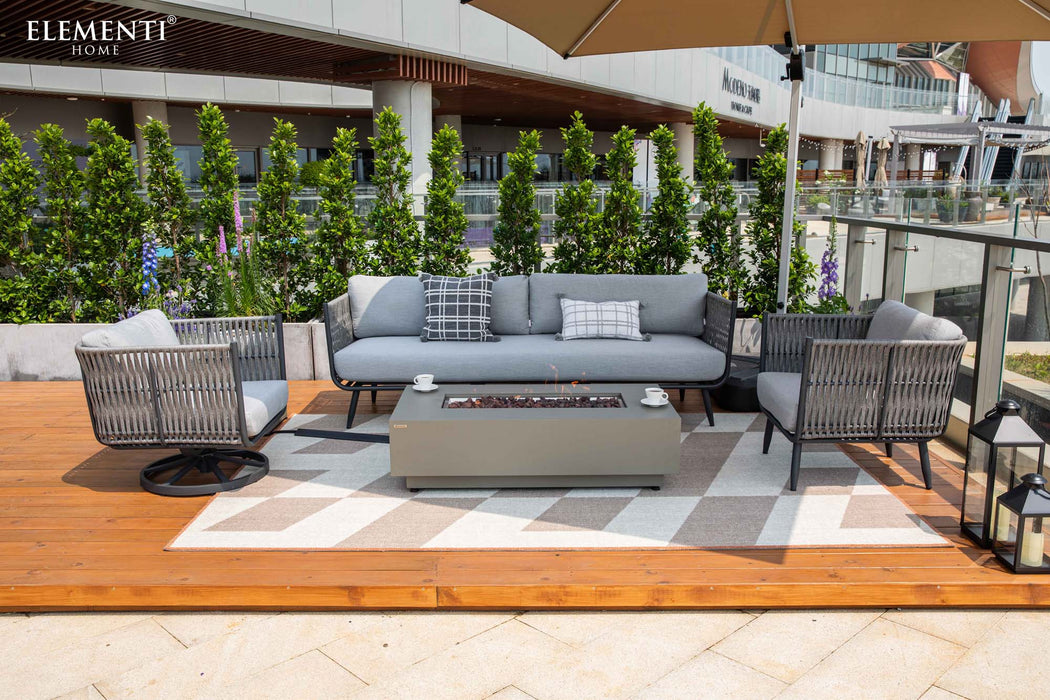 Elementi Milano Collection lounge setting with an umbrella.
