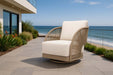 Elementi Malibu Collection chair with clean white cushion showcased in a luxurious beachfront setting, perfect for elevated coastal living style.