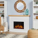 Real Flame Marshall Slim Electric Fireplace in white shiplap mantel styled in cozy living room with round rattan mirror, teal vases, and striped armchair