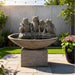 Modern backyard four frog water fountain feature with cascading water streams and decorative planter accents