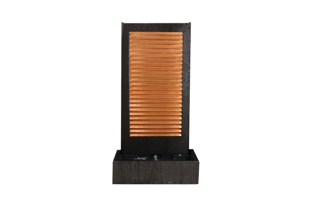 Modern copper panel outdoor water fountain with black textured frame and rectangular basin, shown against neutral backdrop.