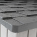 Close-up of the Lifetime Modern Shed's roof shingle corner detail with water droplets.