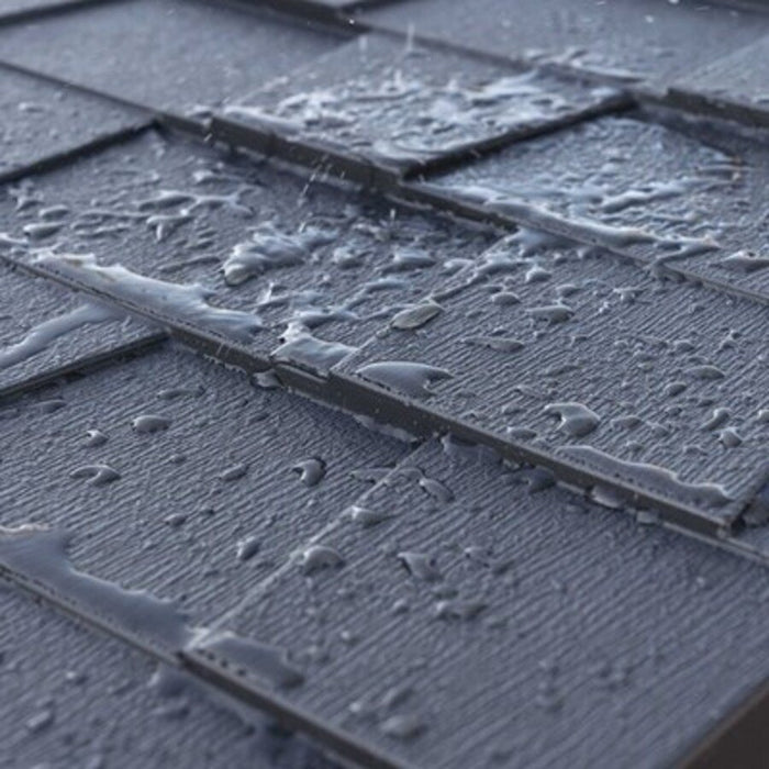 Close-up of the Lifetime Modern Shed's roof shingle texture with water droplets.