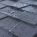 Close-up of the Lifetime Modern Shed's roof shingle texture with water droplets.