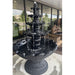 Monaco black finish tiered patio water fountain with cascading streams and large scalloped basin on a concrete surface display