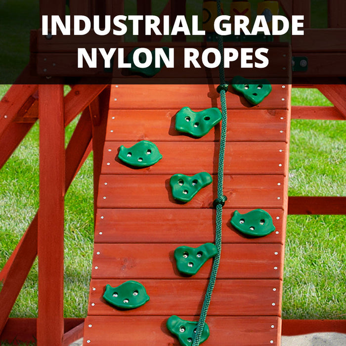 Close-up of the Nantucket II rock climbing wall with green plastic hand grips and industrial-grade nylon rope for safe backyard climbing