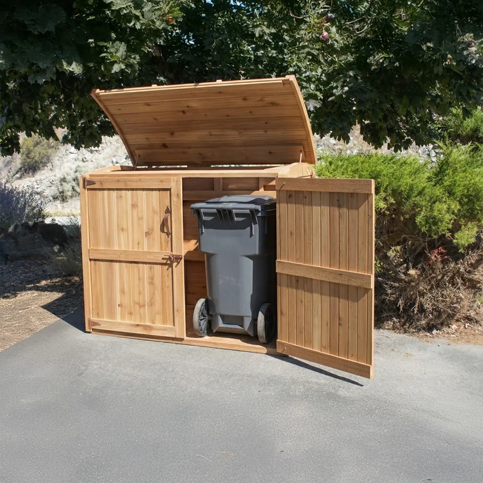 Close-up detail of the Oscar 6x3 waste bin shed, showing wood texture, hinge, and panel construction.