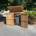 Close-up detail of the Oscar 6x3 waste bin shed, showing wood texture, hinge, and panel construction.