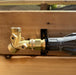 Valve setup of the Outdoor Living Today (OLT) Auto-Watering Kit fixed on a wooden structure.