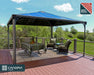 Palram Canopia Palermo 14x14 gazebo installed on deck featuring Heat Block polycarbonate roof panels providing shade and UV protection for outdoor seating area.