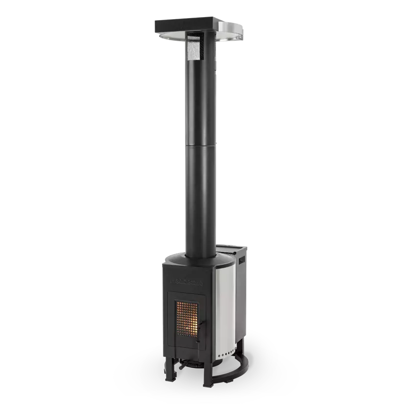 Solo Stove Tower outdoor heater on patio with sleek vertical design and mesh viewing window on white background.