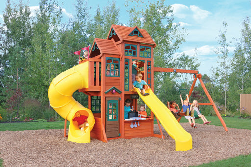 Kids playing on the playground with canyon ridge playset