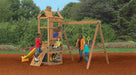 Children playing on Playstar Trainer Bronze playset with swings, climbing wall, and slide outdoors