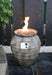 Modeno Fire Pit with flaming rocks