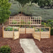Outdoor Living Today Raised Garden Bed Lattice add-on mounted on a cedar raised bed with open gates, herbs, greens and pansies in bloom