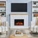 Real Flame Marshall Slim Electric Fireplace in white styled in living room with TV mounted above, flanked by built-in white bookshelves and striped accent chairs