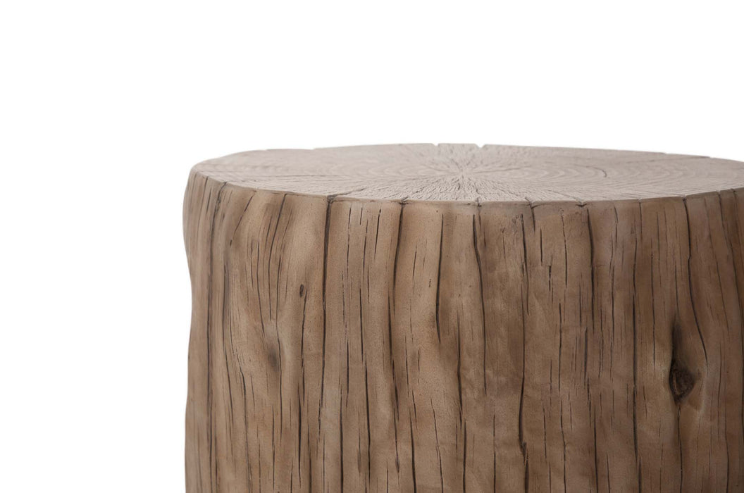 Close-up of the edge of the Elementi Daintree medium red wood coffee table, highlighting the wood grain and natural knots.