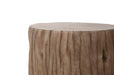 Close-up of the edge of the Elementi Daintree medium red wood coffee table, highlighting the wood grain and natural knots.