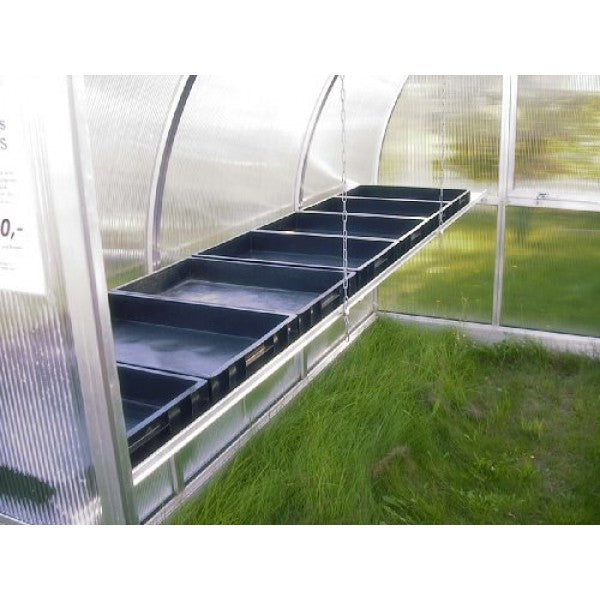 Multiple Exaco RIGA shelf planter boxes installed along a greenhouse frame, suspended by chains and ready for organized planting and seed starting.