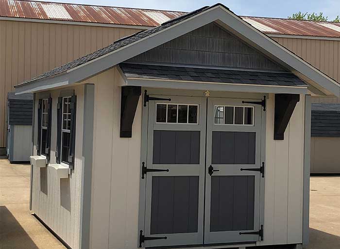 riverside outdoor storage shed on display with an extra roof accent