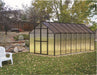 Riverstone MONT Greenhouse Premium 16ft version with durable aluminum frame and multi-wall panels in landscaped yard