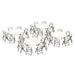 Overhead studio shot of four Lifetime round tables grouped with folding chairs, white background.