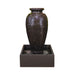 Rust brown amphora water fountain with square basin in a white background.