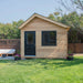 Front view of Saltbox Studio Shed 12x8 featuring Western Red Cedar siding and black metal roof