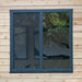 Horizontal Western Red Cedar siding and black-framed window on Saltbox Studio Shed 12x8