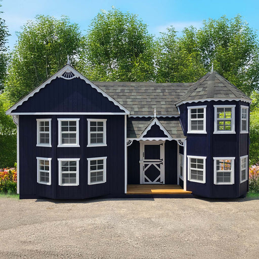 Front view of Sara’s Victorian Mansion playhouse from Little Cottage Co., navy blue siding with white trim and charming Victorian-inspired details