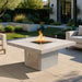 Cal Flame Sedona 48-inch fire pit shown in a modern outdoor patio with flame running.