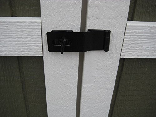 Close-up of the door hardware on the Little Cottage Company Gable Value Shed, featuring black latches and white trim.