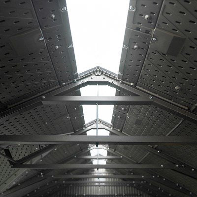 Interior view of the Lifetime storage shed's roof truss and ridge skylight structure.
