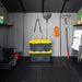Interior view of the Lifetime storage shed with shelving, a mower, storage bins, and folding chairs.
