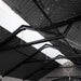 Close-up interior view of the Lifetime storage shed's steel A-frame trusses and ridge skylight panels.