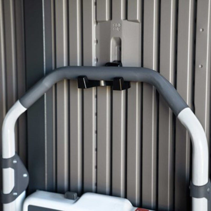 Close-up of a mower handle mounted on the Lifetime Modern Shed's interior wall hook.