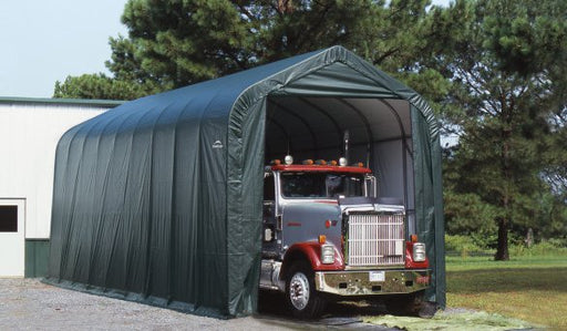 Large green ShelterLogic Sheltercoat 16x44 garage with enough space for storing a semi-truck. This spacious shelter provides protection for oversized vehicles.