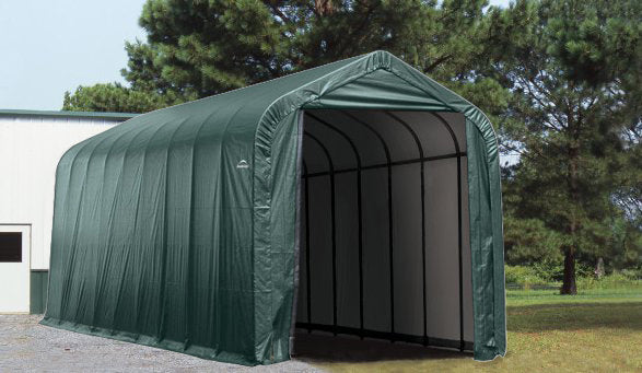 Empty ShelterLogic ShelterCoat 16 x 44 ft. garage with green peak roof, ready for vehicle or equipment storage