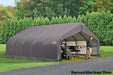 Large gray ShelterLogic tent with a peak roof sitting on a lush green field next to a gravel driveway. 
